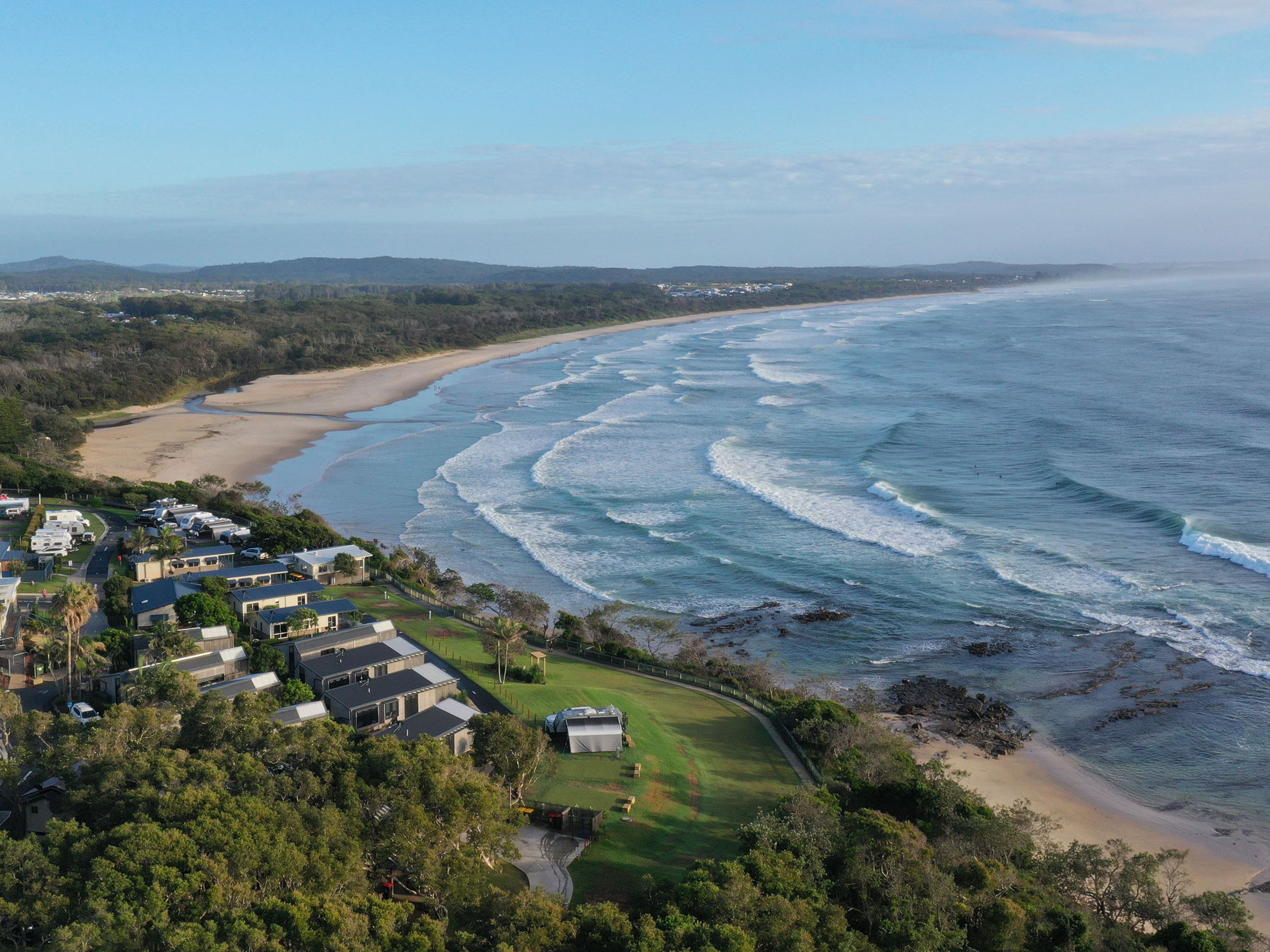 Reflections Holidays Bonny Hills holiday & caravan park aerial drone view overlooking the ocean