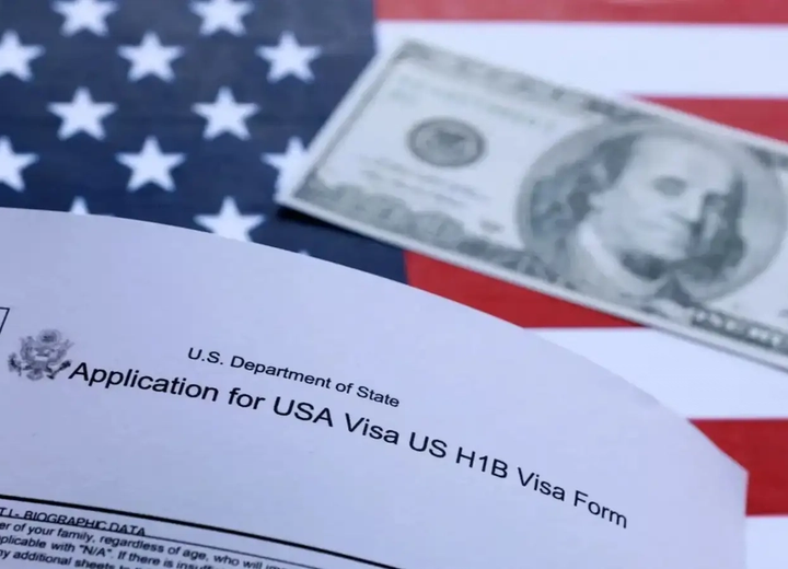 H-1B visa documents representing the $100,000 US visa payment and its impact on Indian technology workers