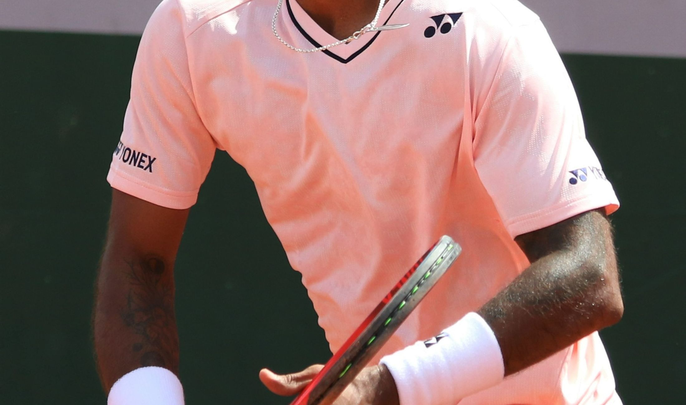 Sumit Nagal serving in professional tennis match