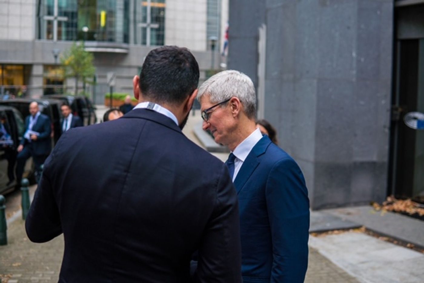 On the sidelines of the conference with Apple CEO Tim Cook