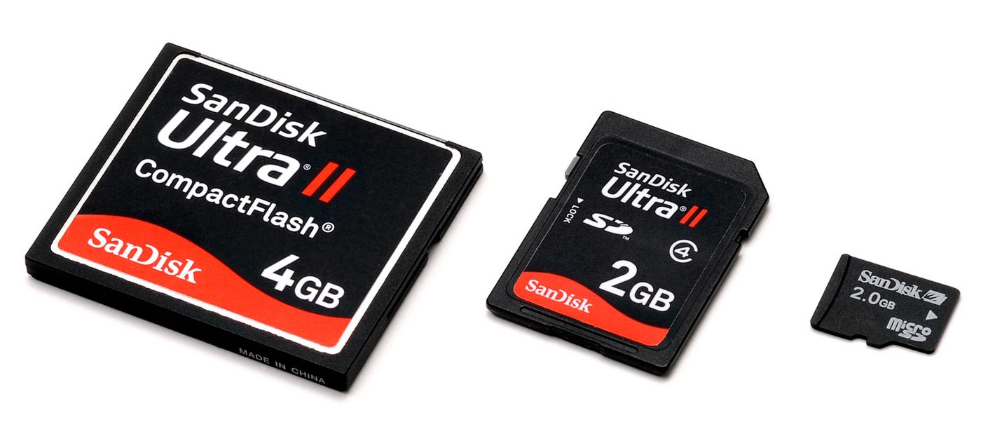 A comparison of three different size memory cards. Left to right: compact flash, SD card and micro SD.