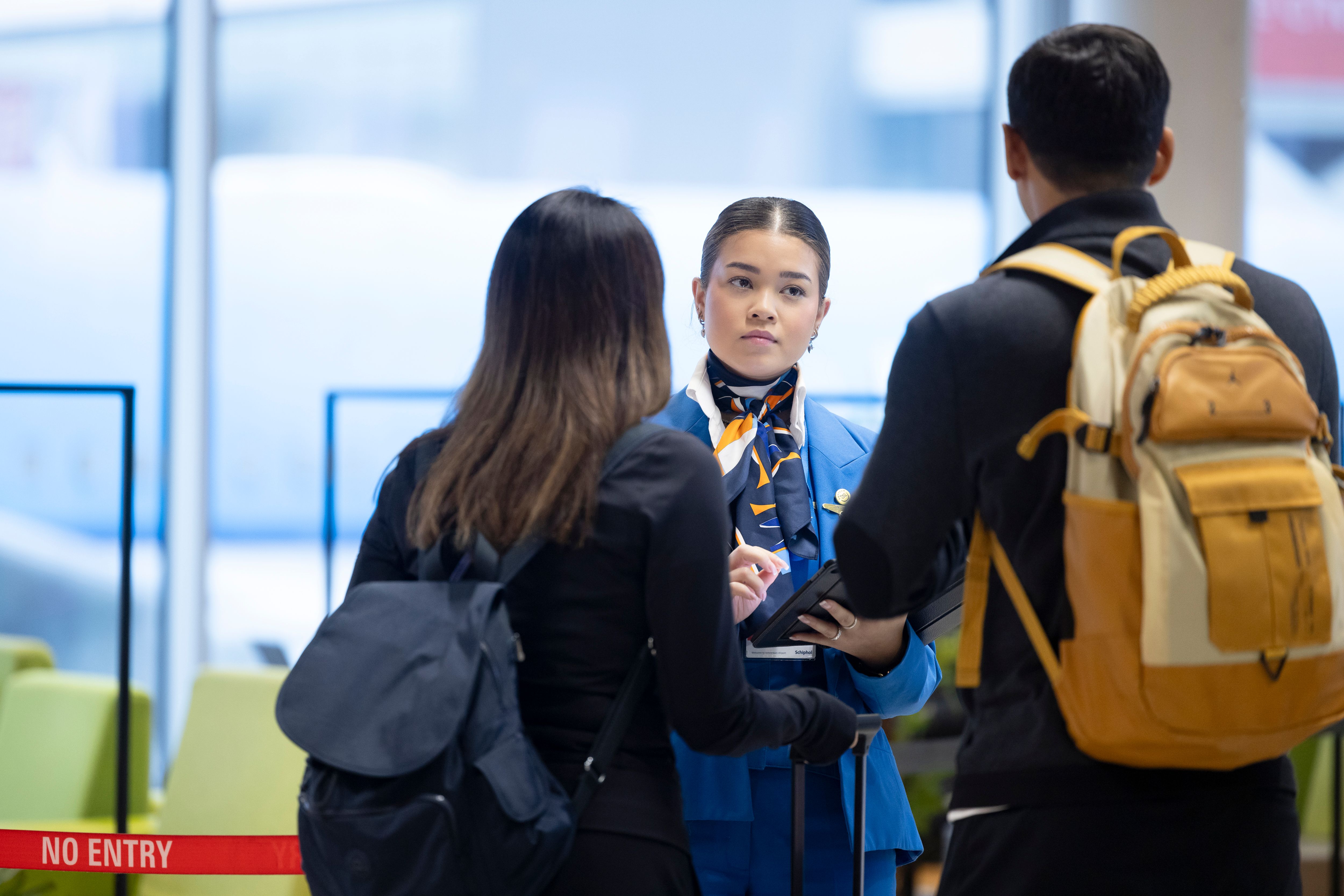 Passengers talking to ground staff
