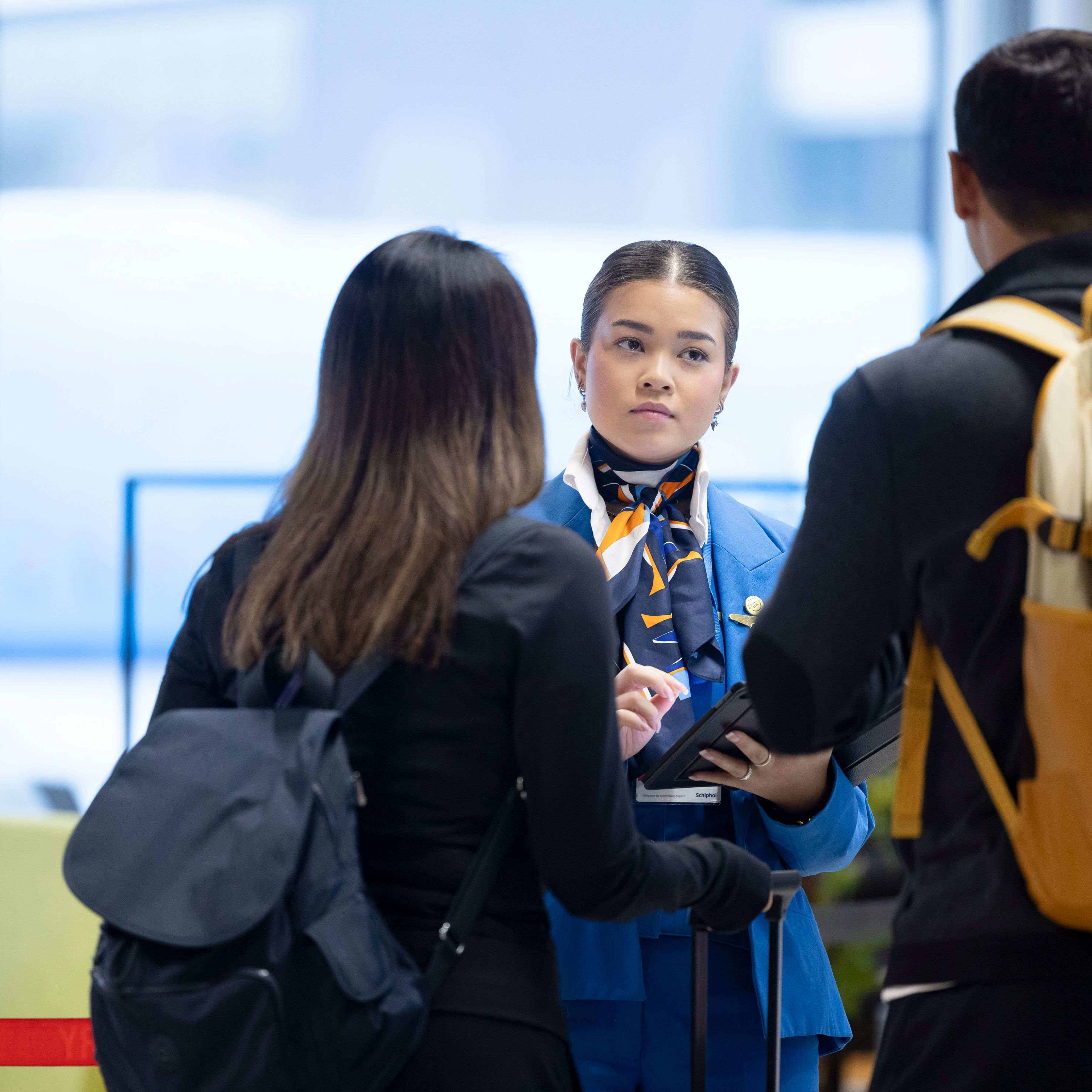 Passengers talking to ground staff