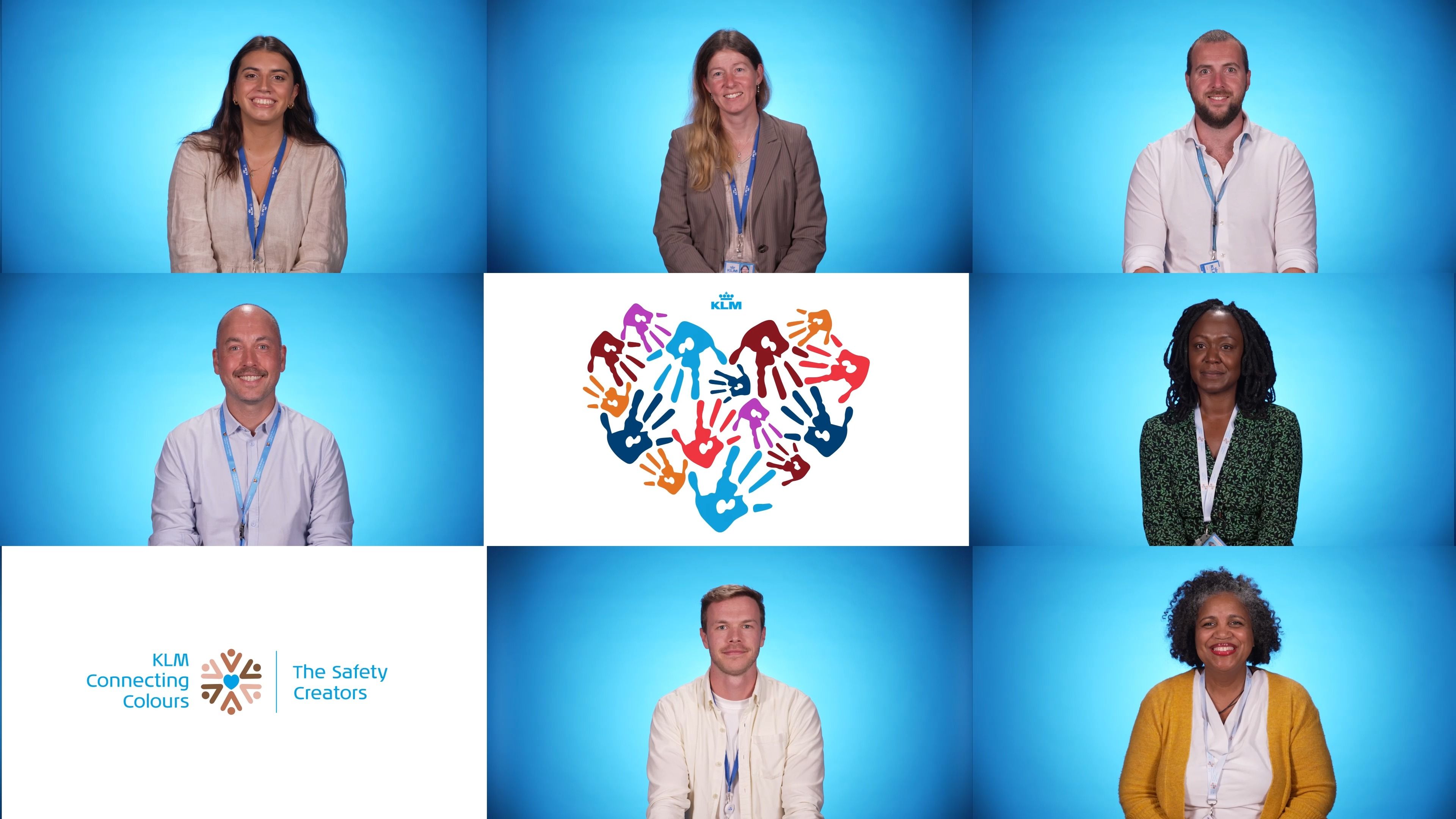 Meerdere mensen voor een blauwe muur met een logo van connecting colors in het midden