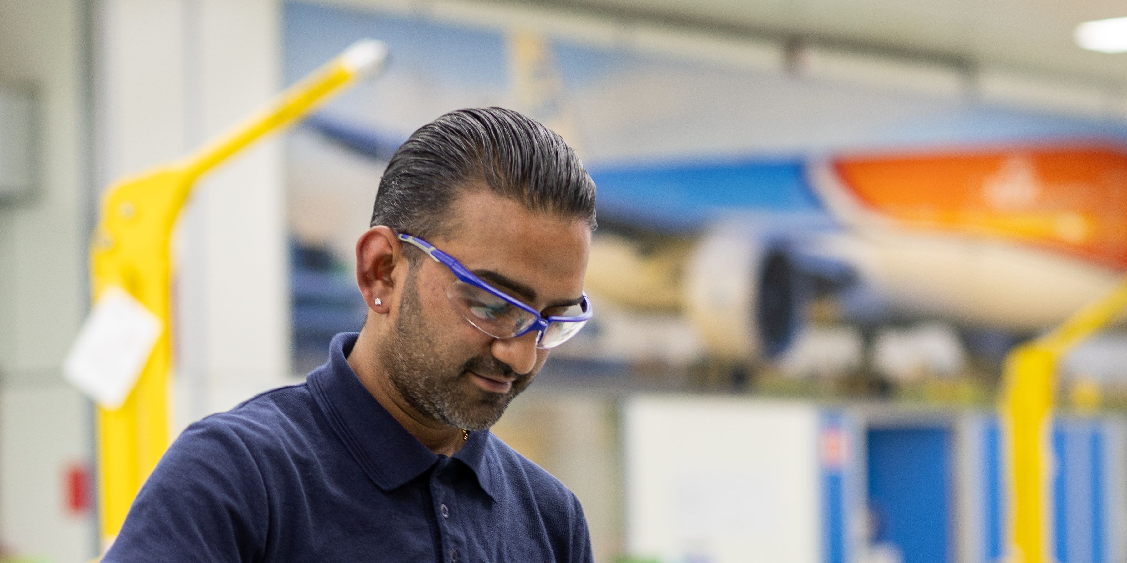 Mechanic working on a component