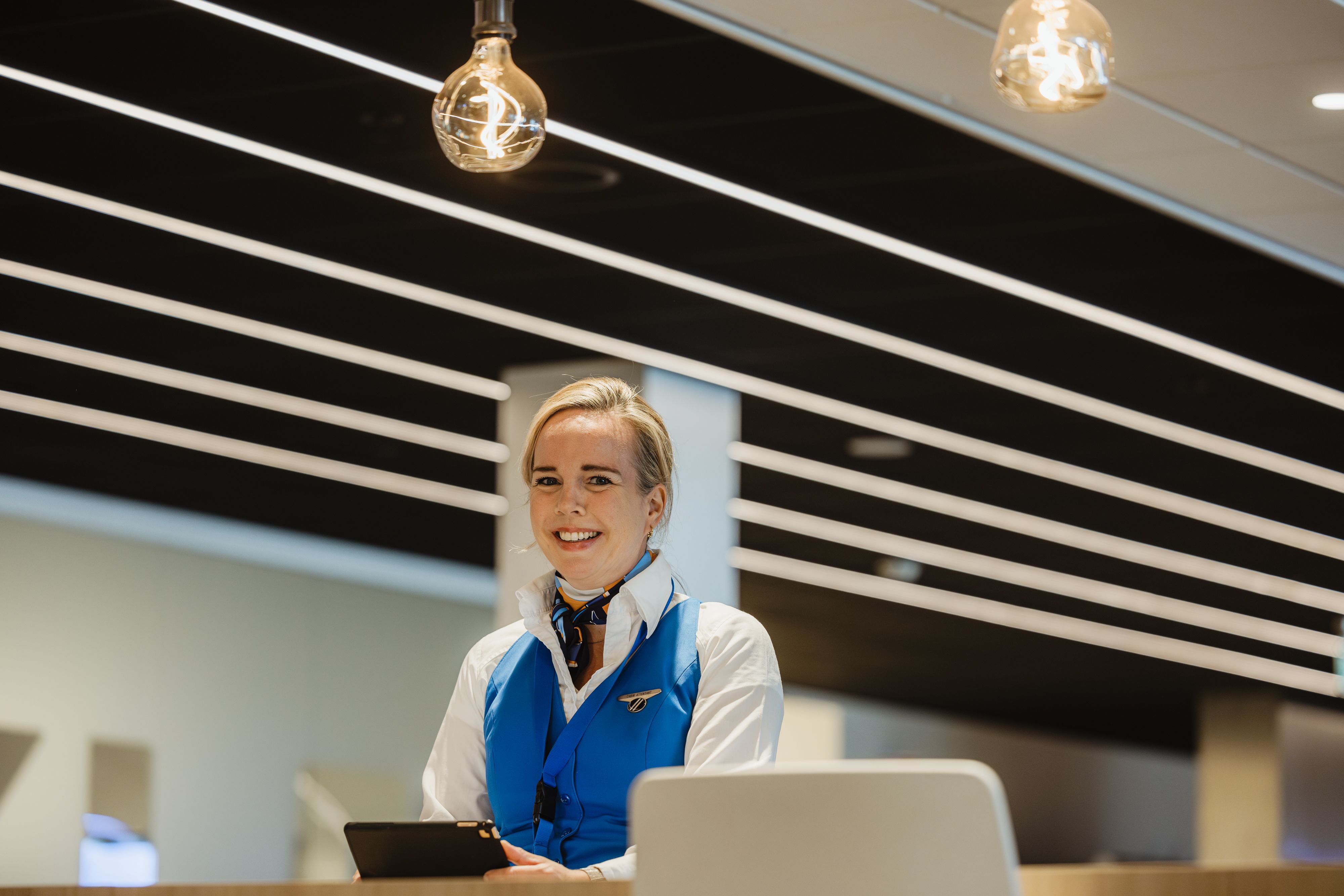 KLM check-in staff at work 