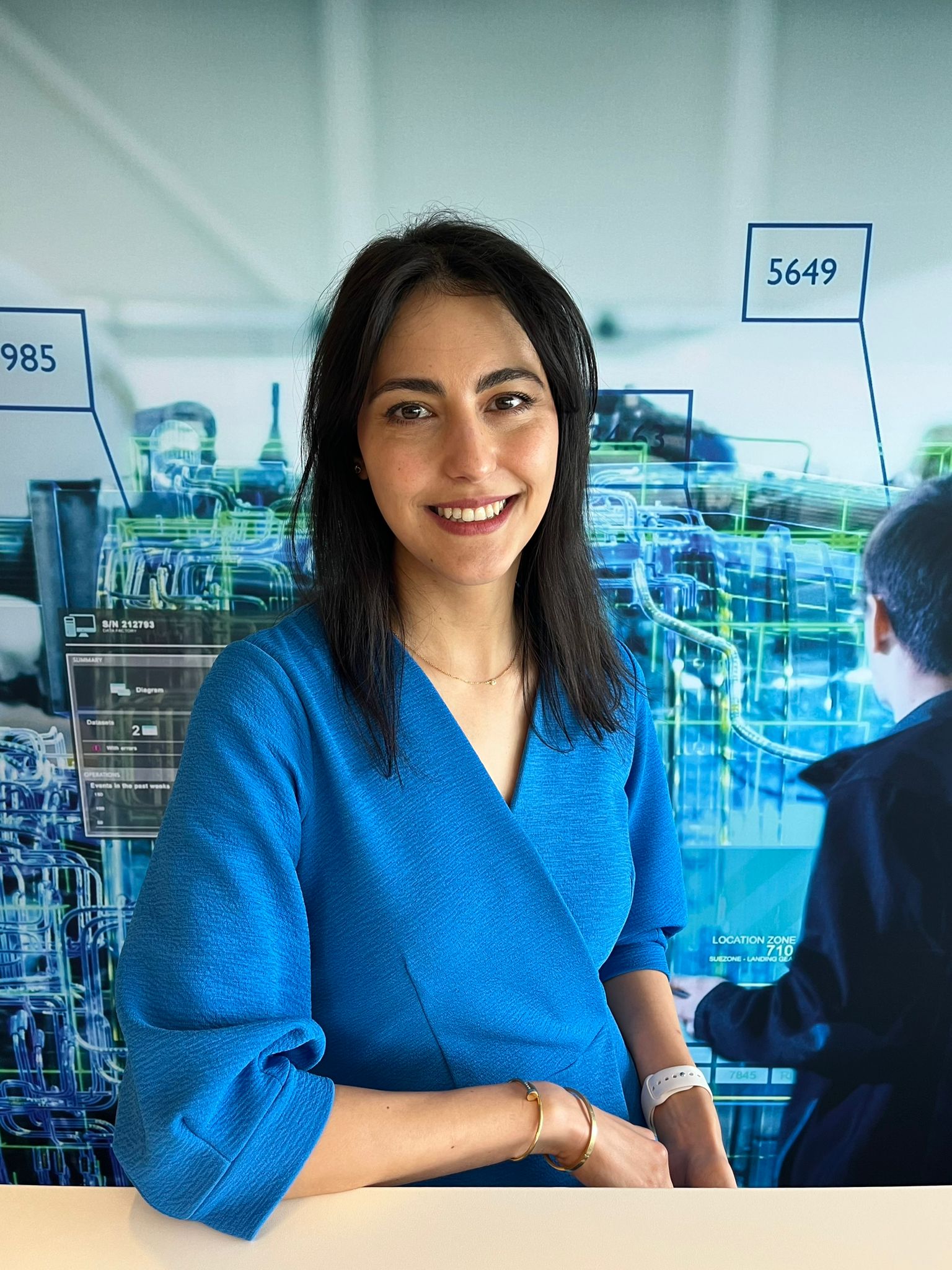KLM colleague posing in the office