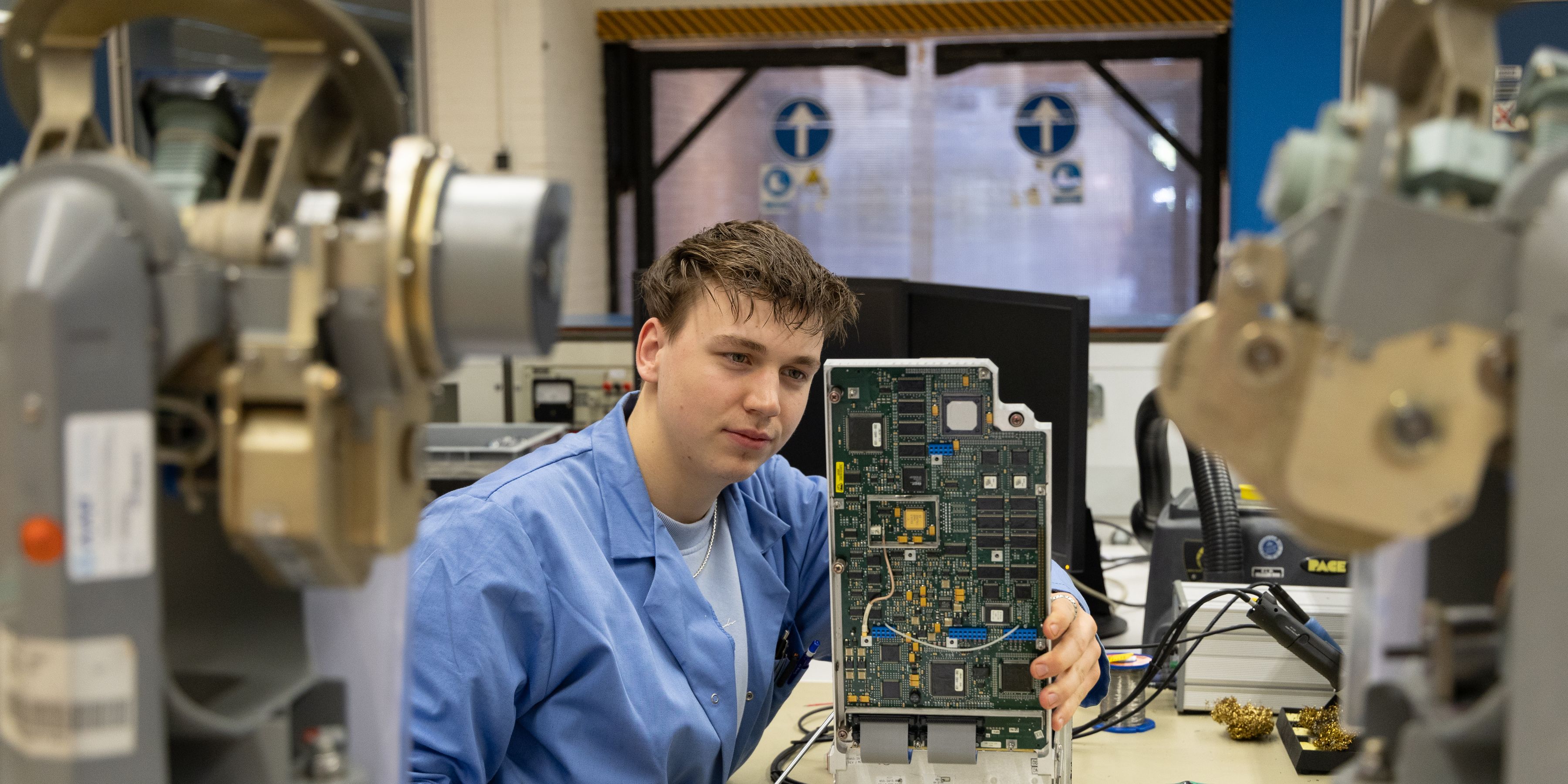 E&M colleague working on avionics