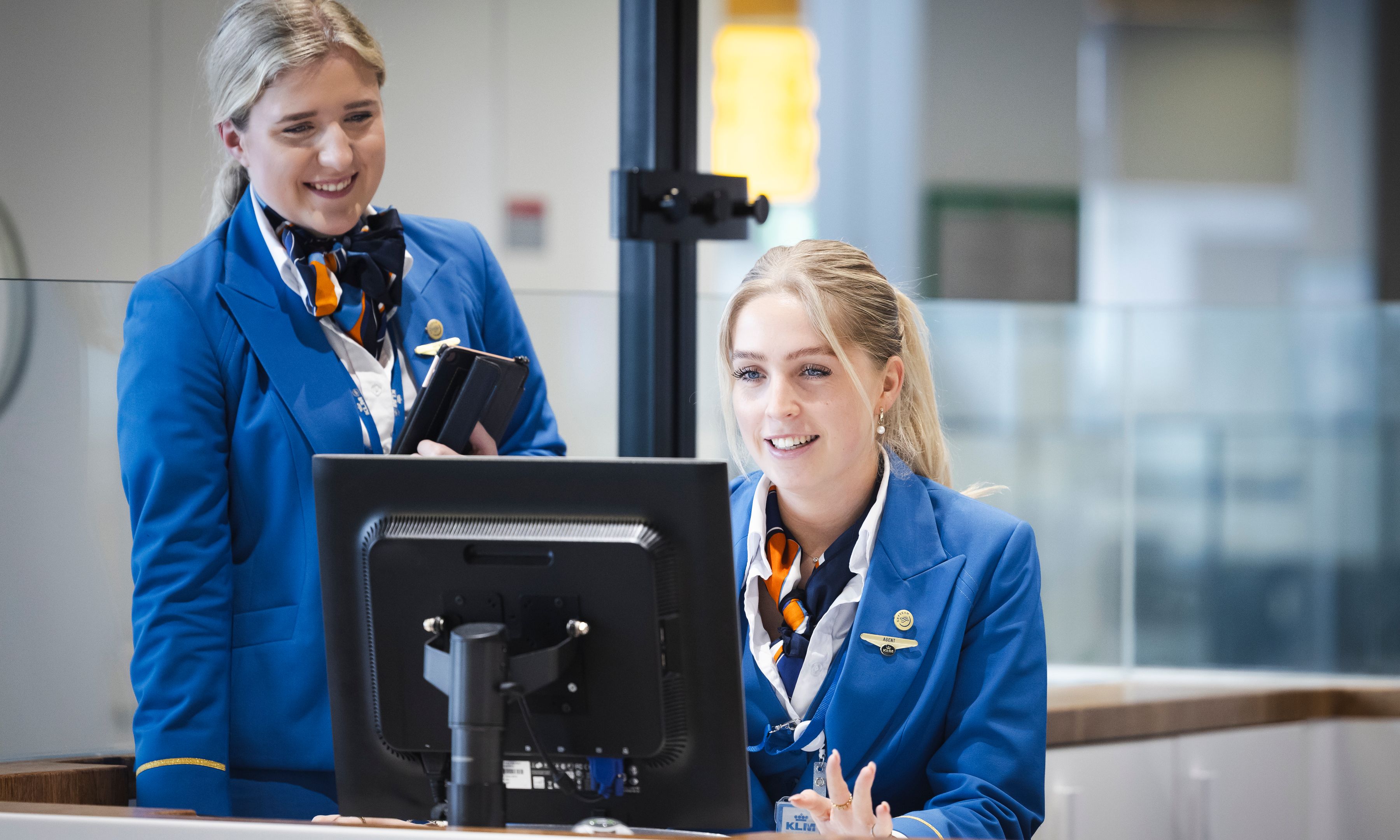 KLM check-in staff at work