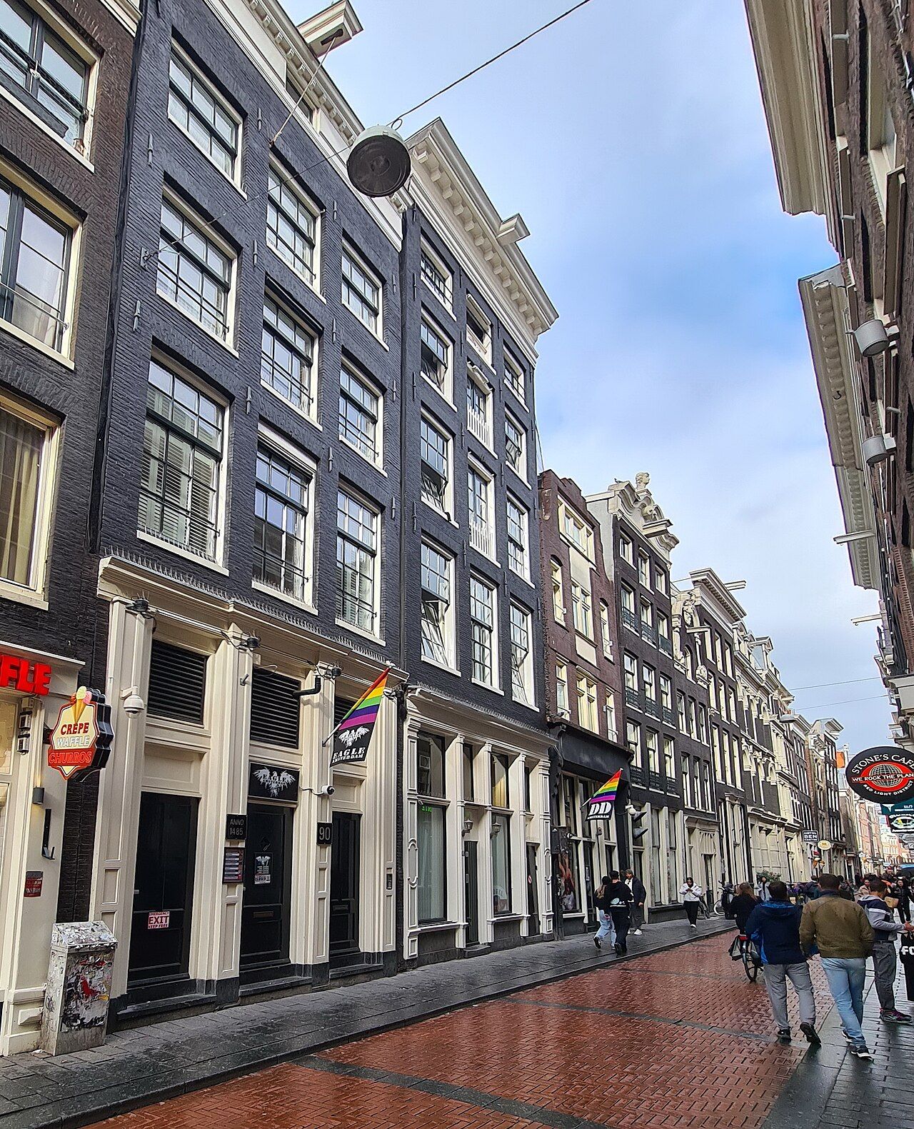 Warmoesstraat at number 90 and the buildings below it