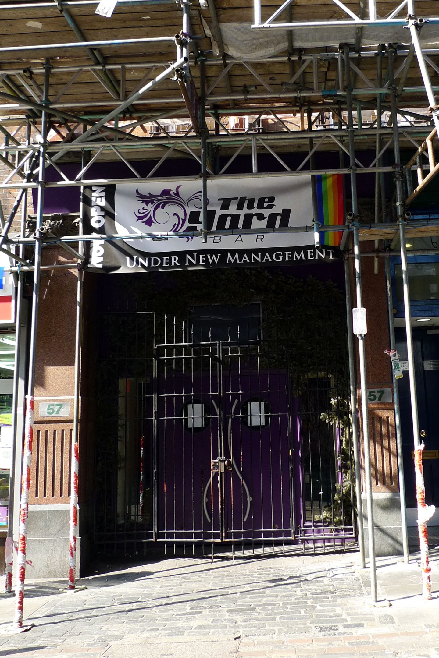 Street gate into The Yard at 57 Rupert Street, Soho