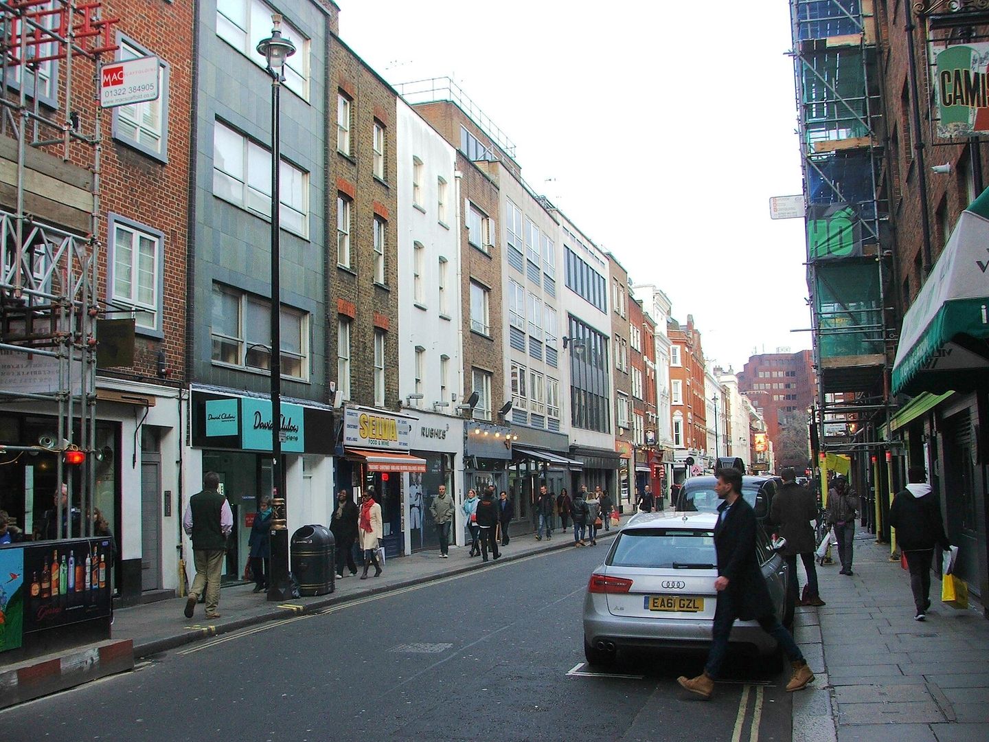 Old Compton Street in Soho, looking along the pub terraces