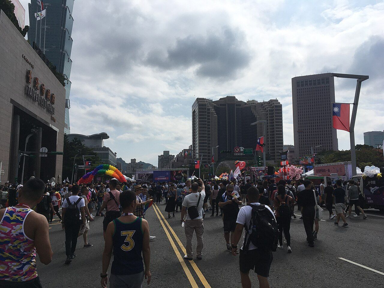 Rainbow flags and marchers at Taiwan Pride near Taipei City Hall
