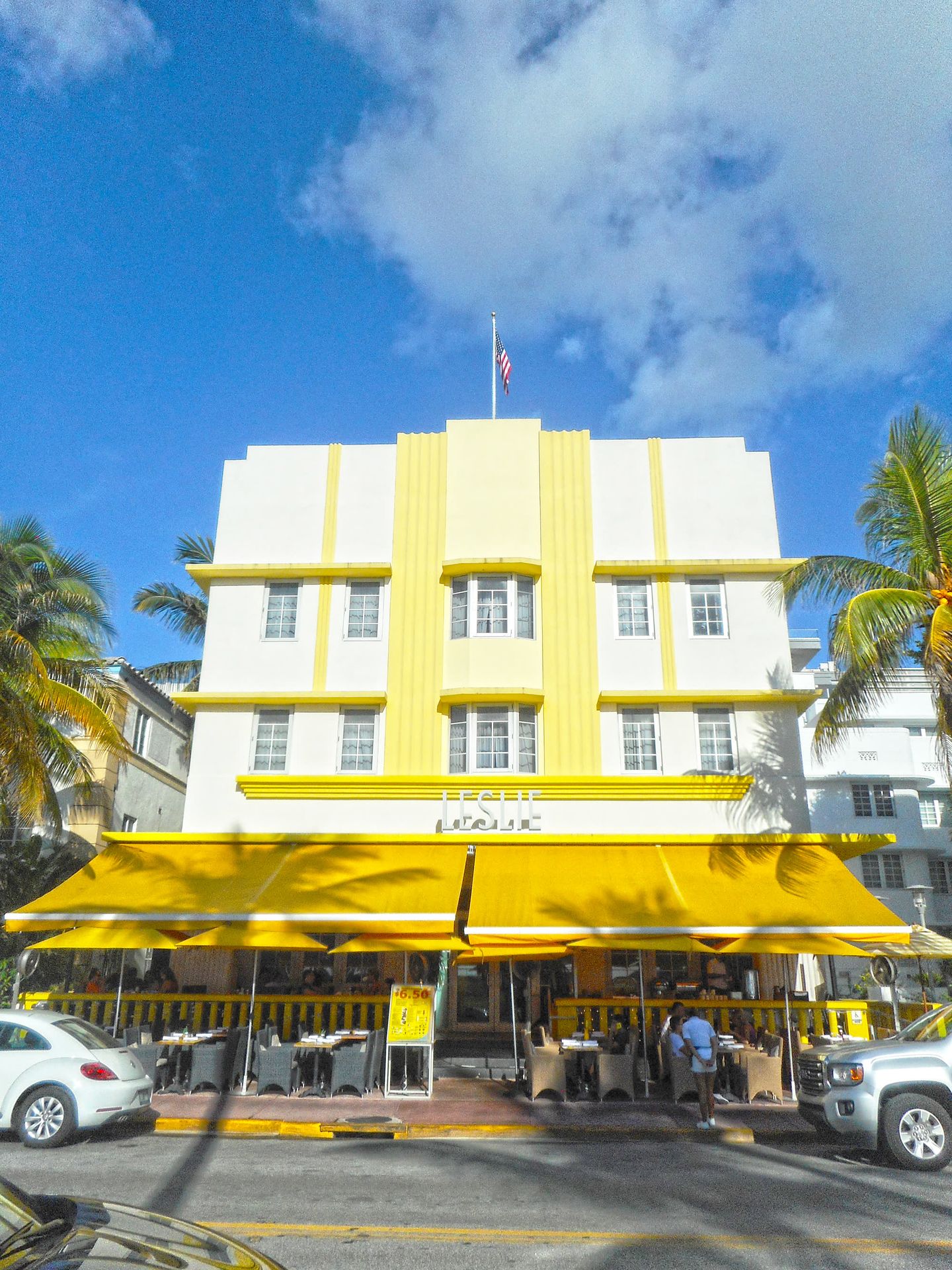 Leslie Hotel yellow Art Deco facade and awning on Ocean Drive, South Beach