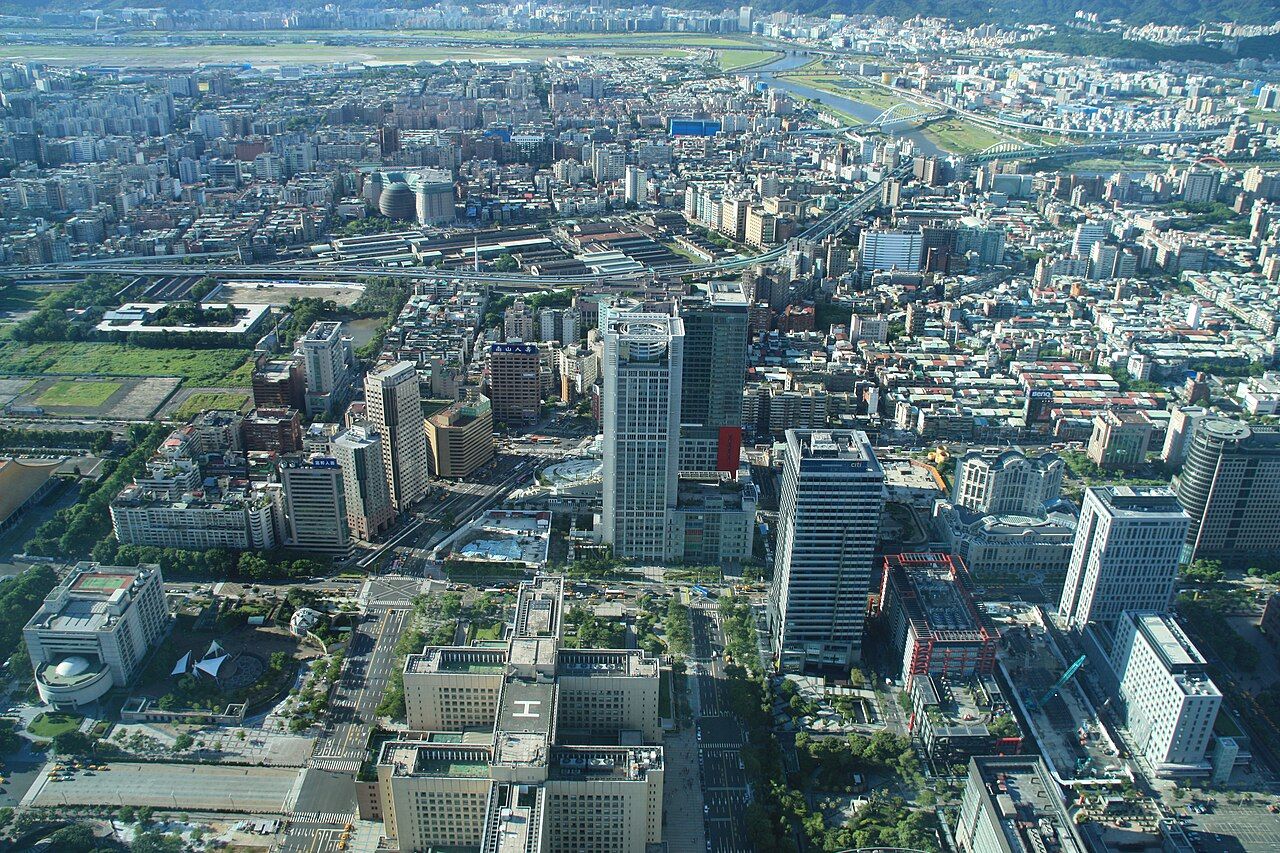 An elevated view over Xinyi with Taipei City Hall and surrounding streets