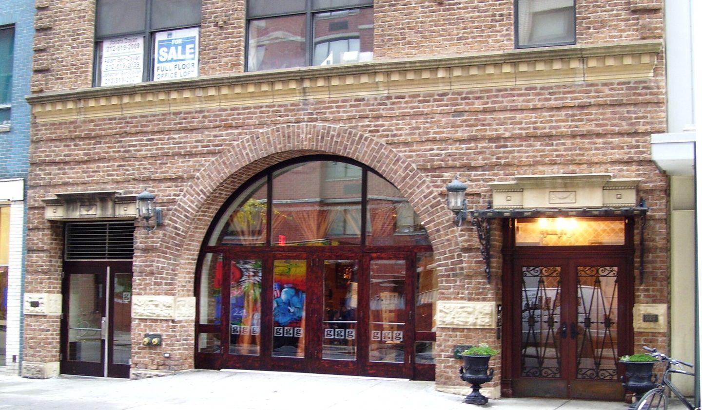 g Lounge storefront at 225 West 19th Street with the sign above the entrance