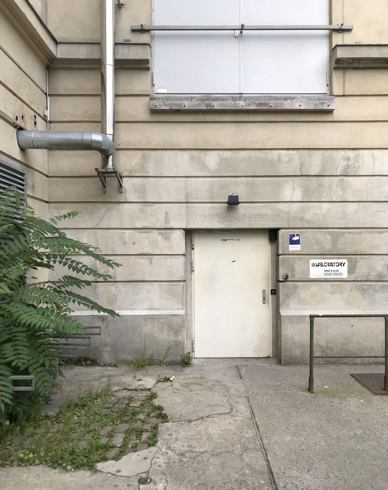 Lab.oratory entrance with LAB.ORATORY MEN'S CLUB sign