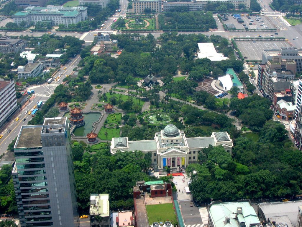 Trees, paths, and the central monument in 228 Peace Memorial Park