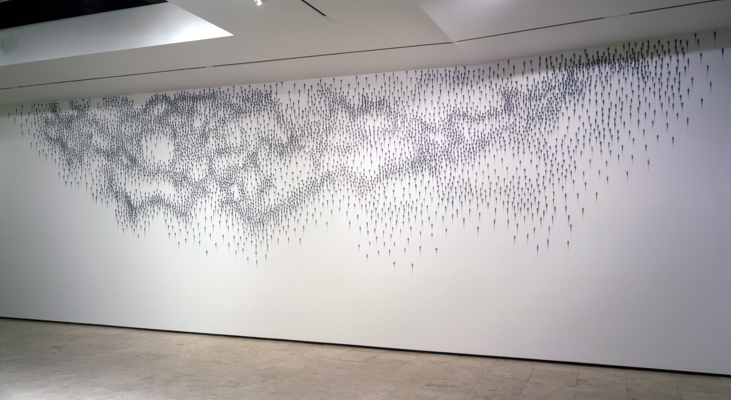 Graphite wall installation by Teresita Fernández