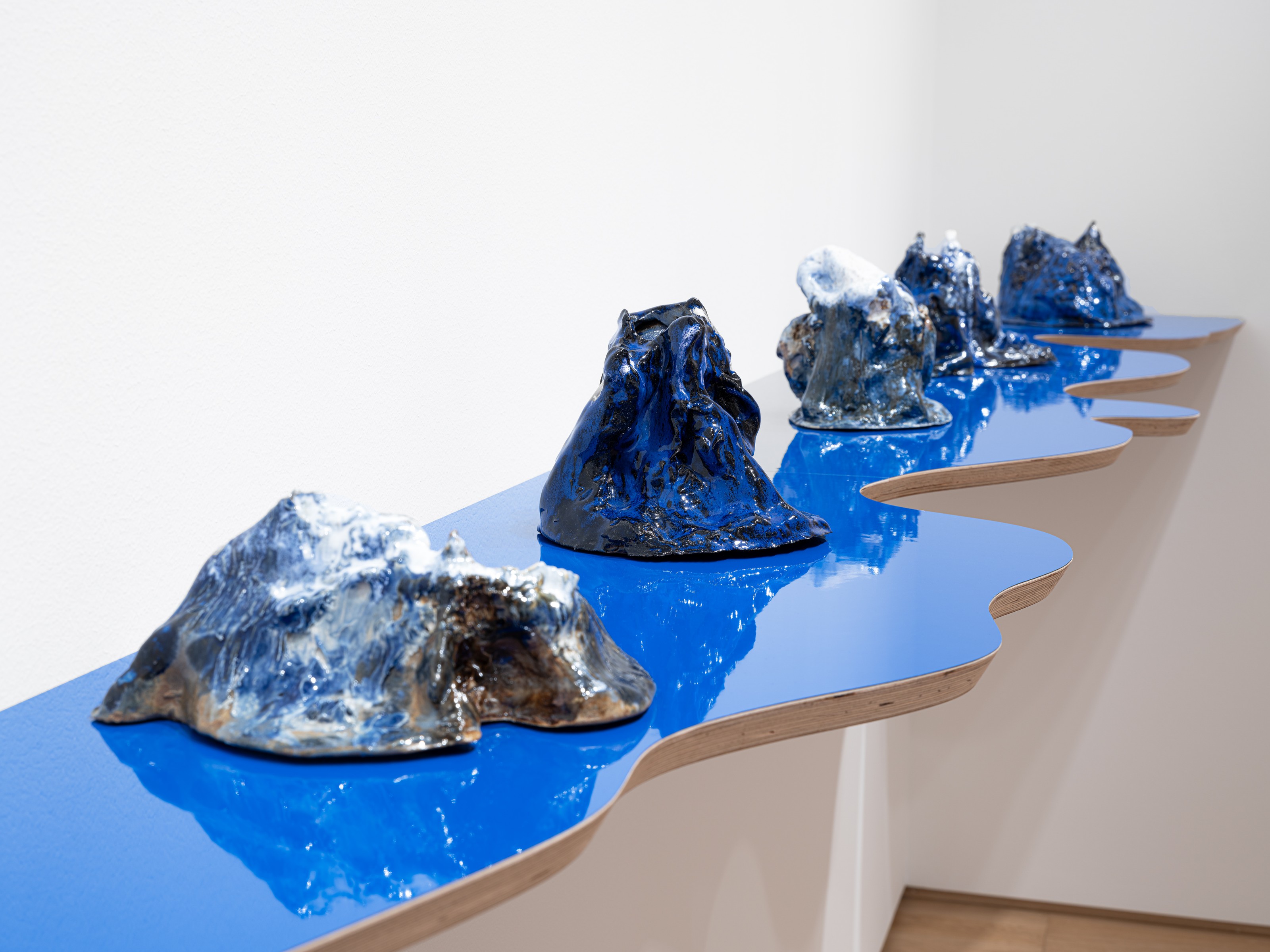 Installation view of Mountains Don't Know Their Names at PoMo