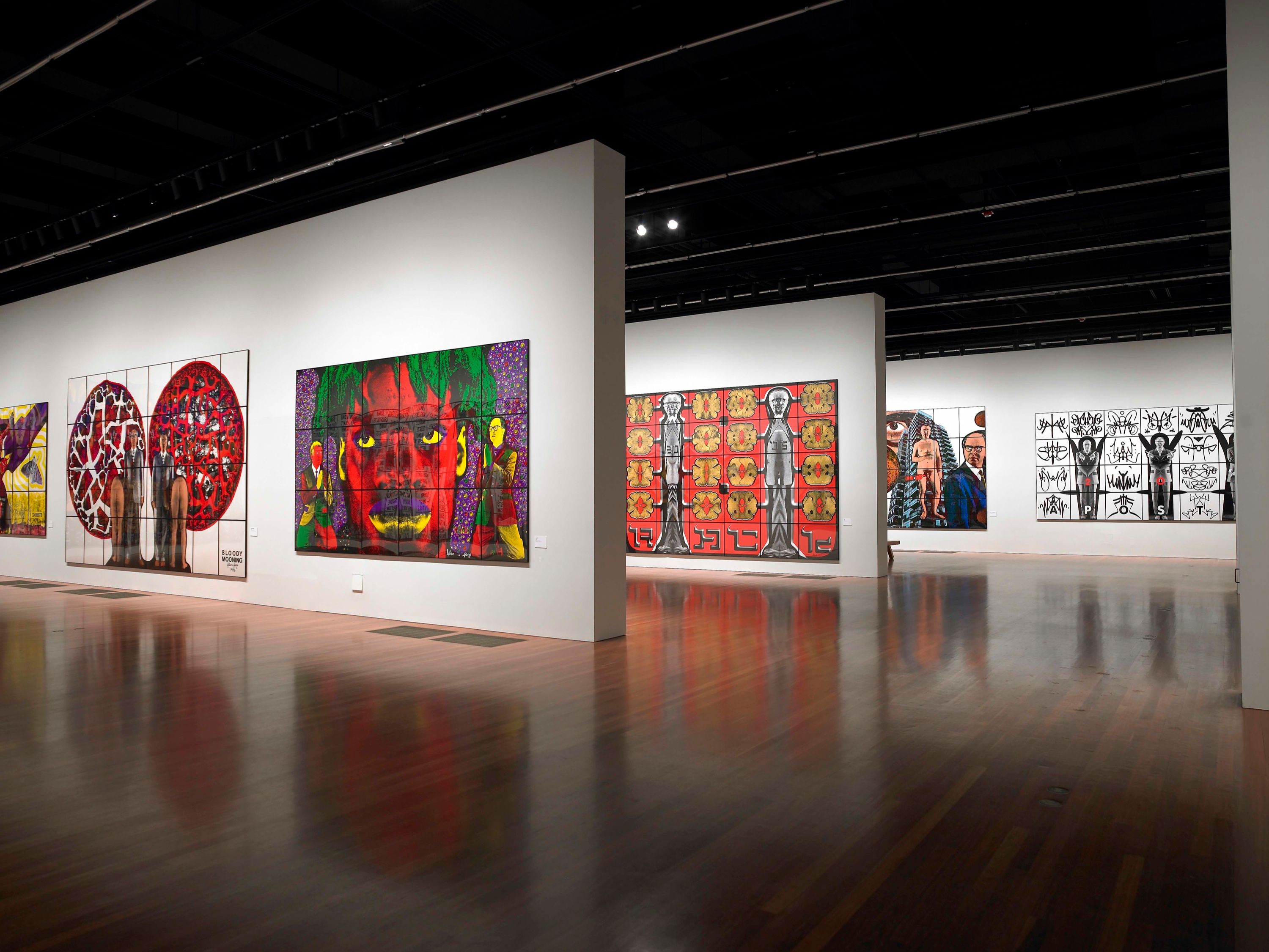 Installation view of Gilbert & George: Major Exhibition at de Young Fine Arts Museum