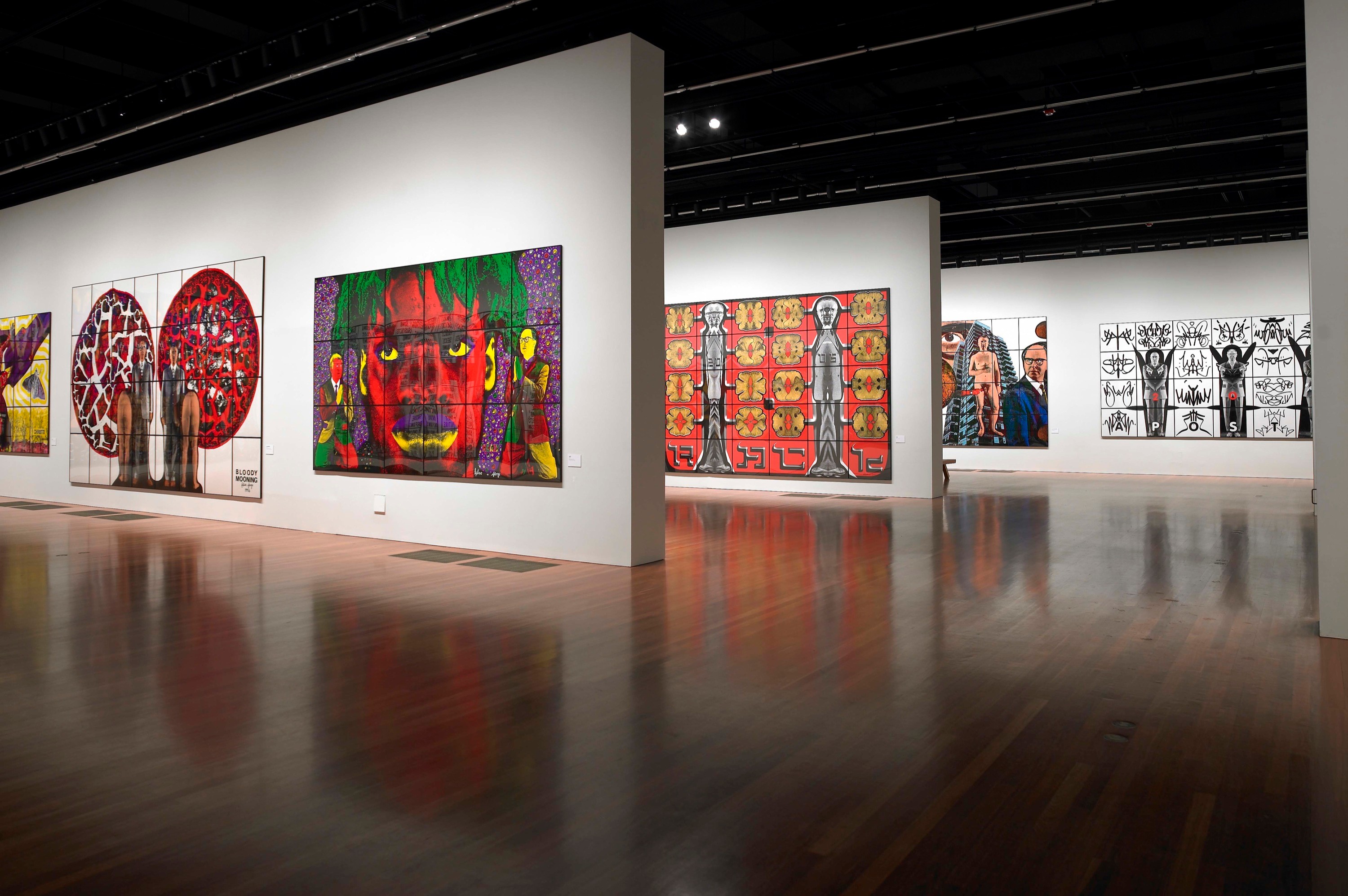 Installation view of Gilbert & George: Major Exhibition at de Young Fine Arts Museum