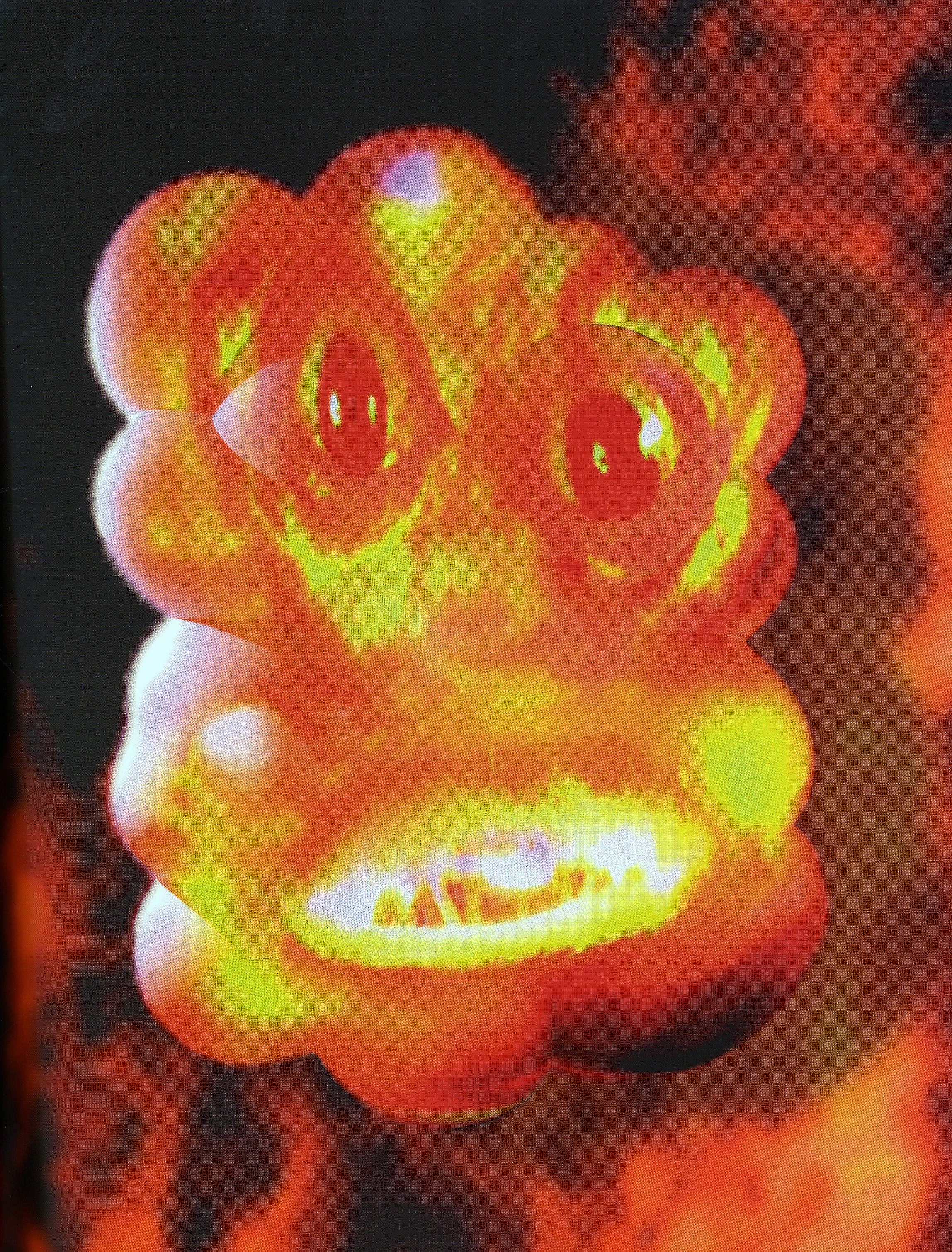 Sculpture and video panel by Tony Oursler
