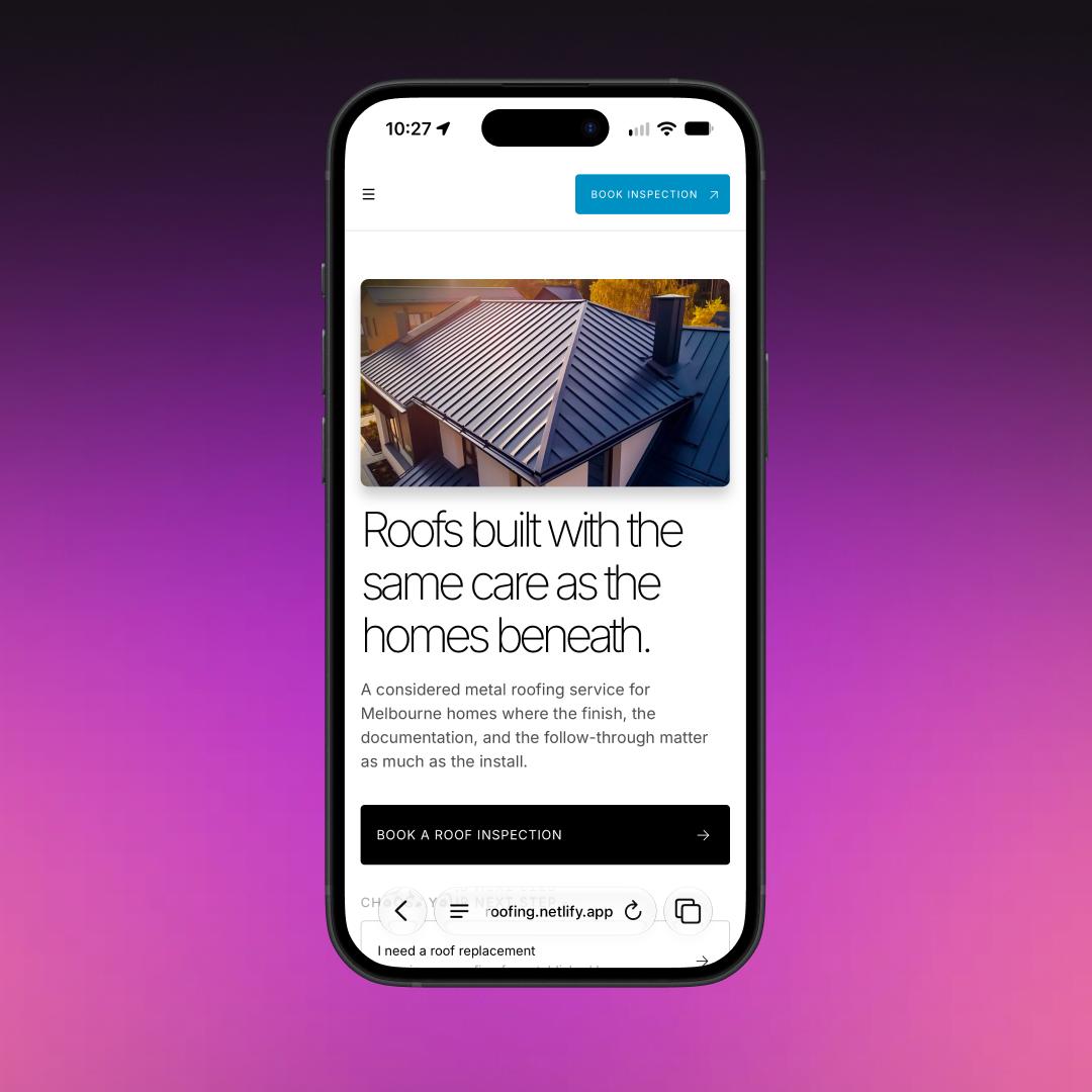 Smartphone showing a mobile website design for a Melbourne metal roofing service, with a hero image and “Book a roof inspection” call to action