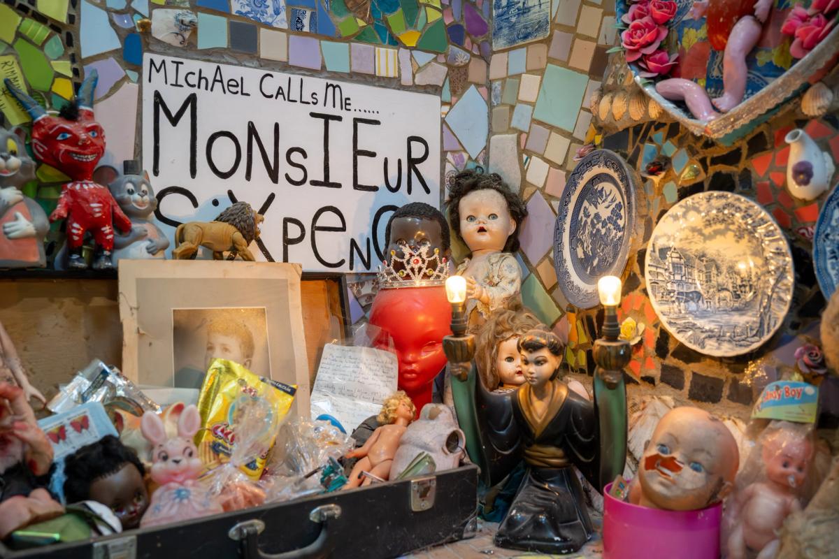 Mosaics, text and found objects inside Stephen Wright's House of Dreams Museum.