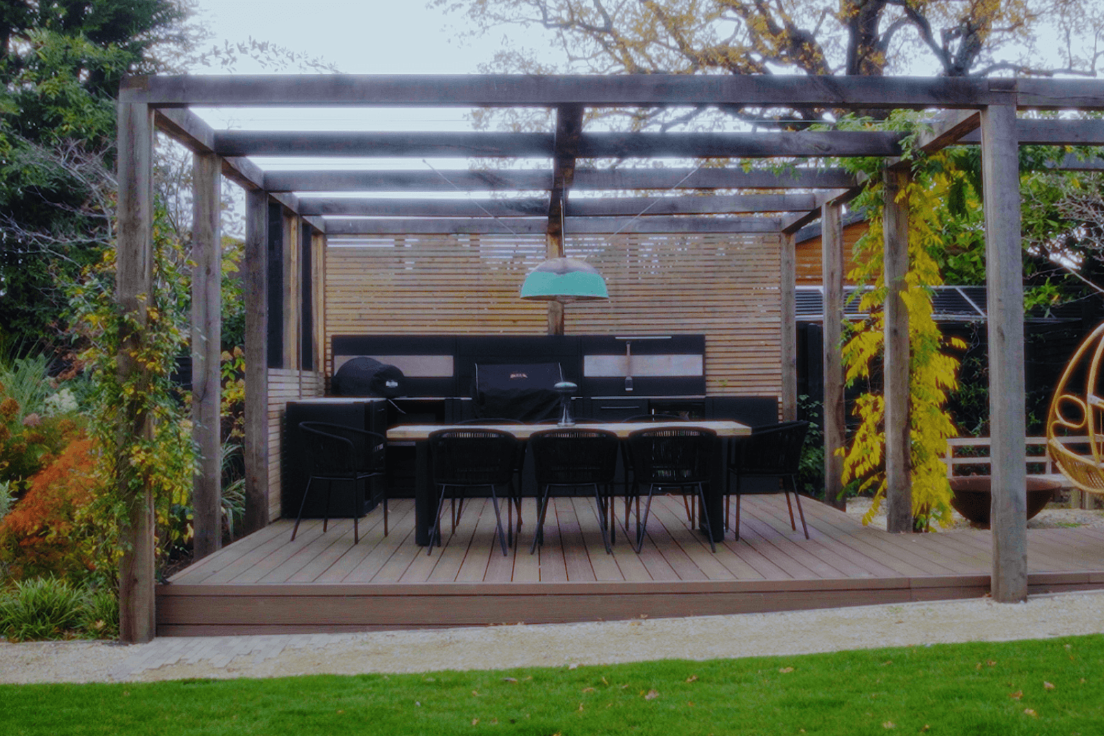 Beckenham outdoor kitchen with timber pergola, decking and garden dining space