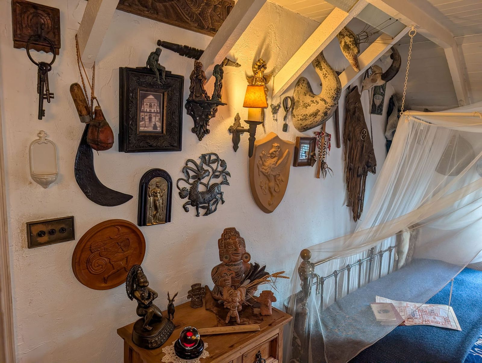 A wall of gathered artefacts and objects at Talliston House and Gardens.