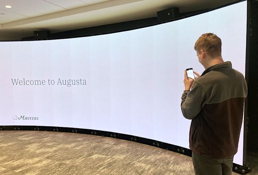 A massive LED screen in the IBM suite at the Masters Tournament which displays the web app presentation