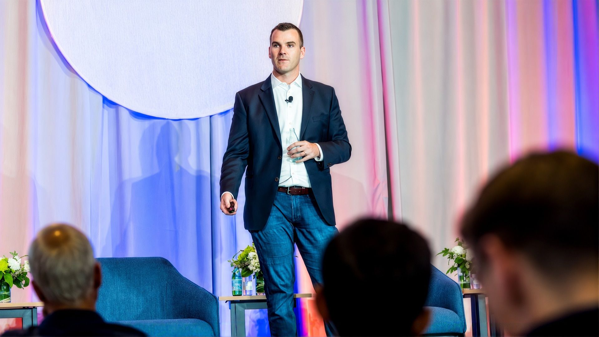 Patrick Thompson speaking on stage