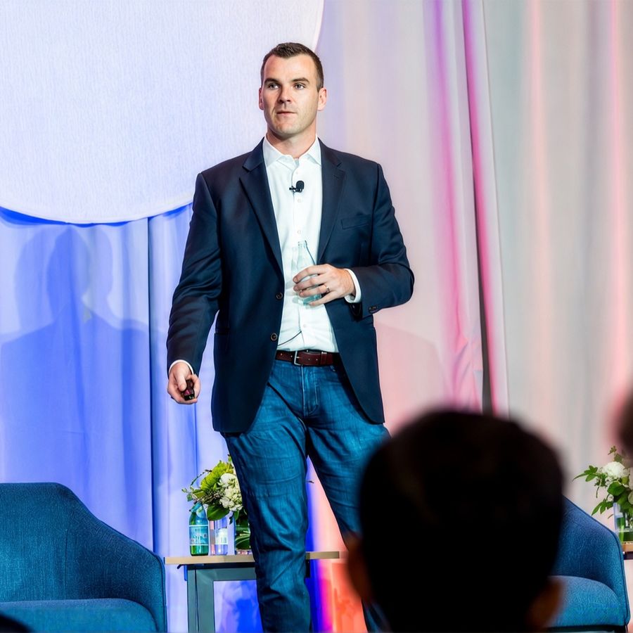 Patrick Thompson speaking on stage