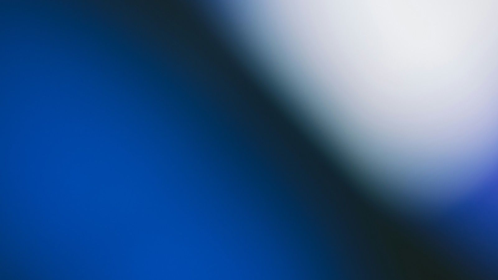 Deep blue light giving way to a soft white glow