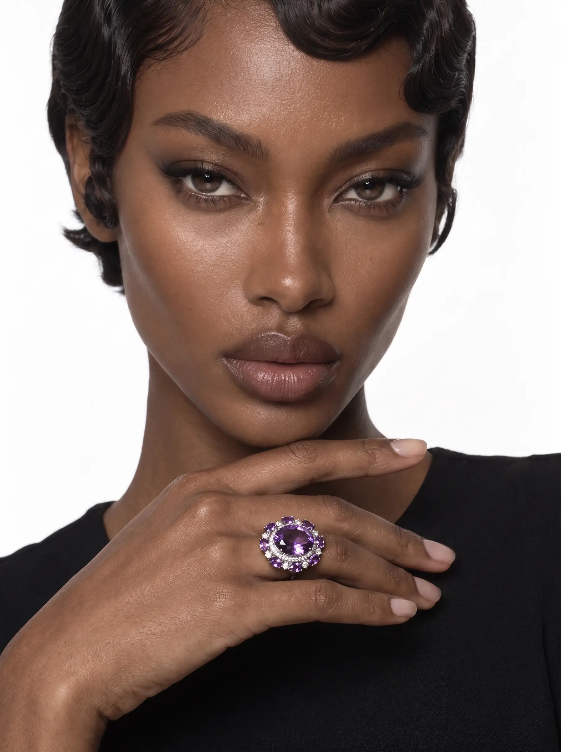 Model wearing the Violet Bloom amethyst cocktail ring, hand at the chin