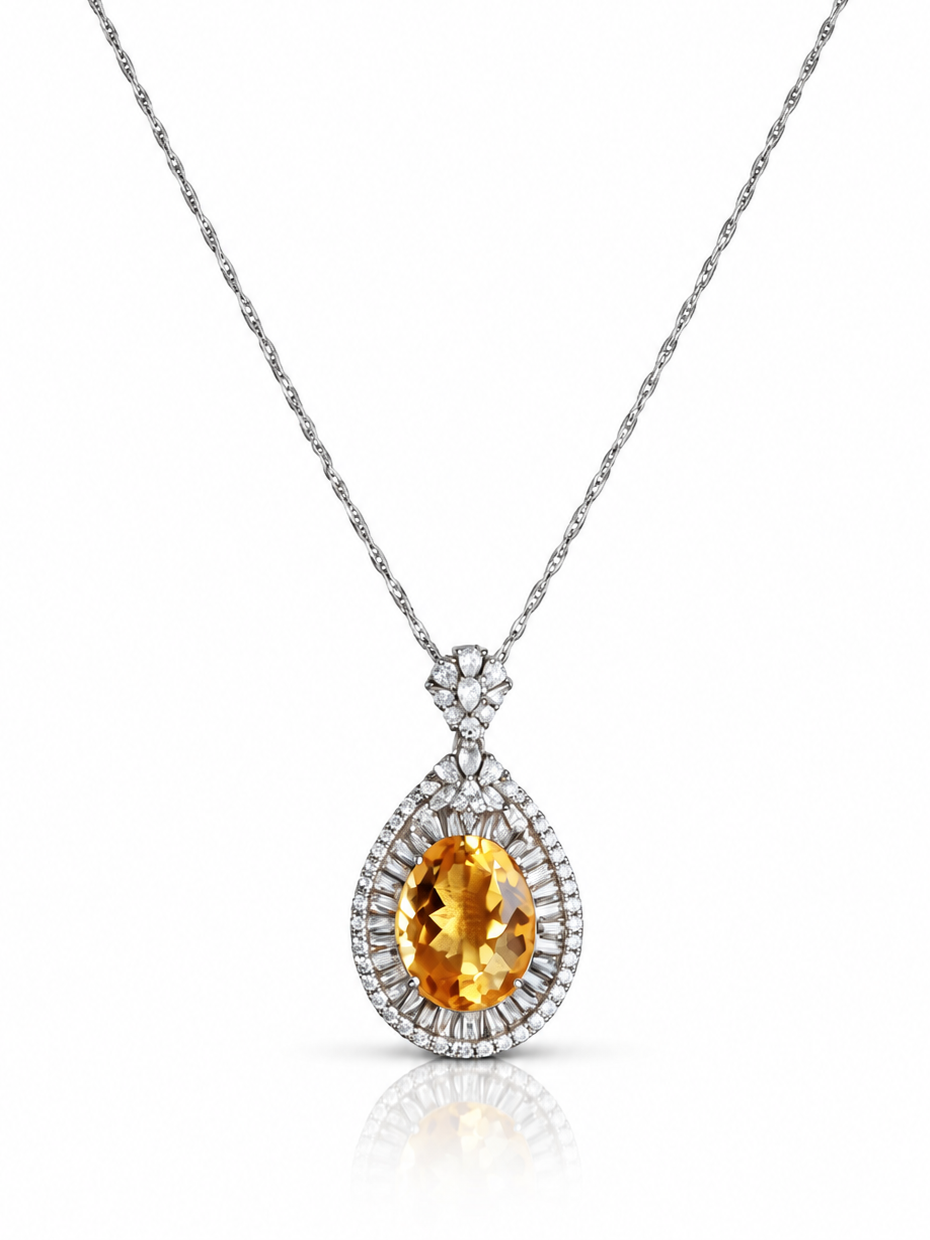 Citrine oval pendant necklace with a layered teardrop halo of cubic zirconia in sterling silver on a white background