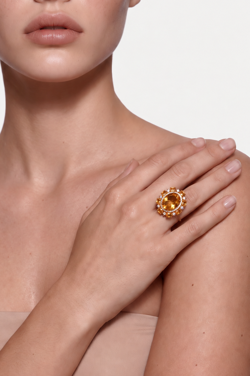 Model wearing the Golden Tide citrine cluster ring, hand resting on the shoulder