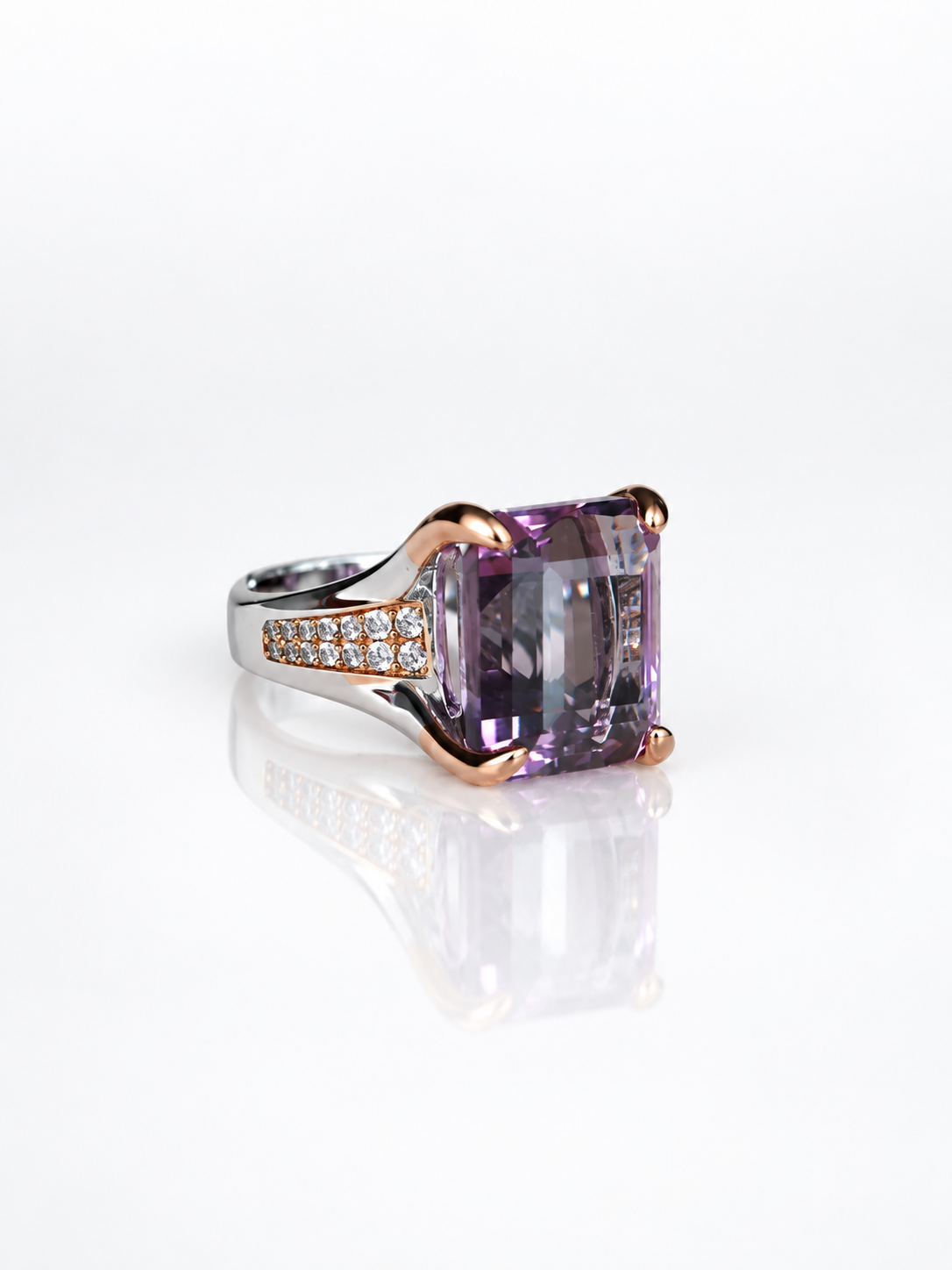 Emerald-cut amethyst ring, side view showing the two-tone band
