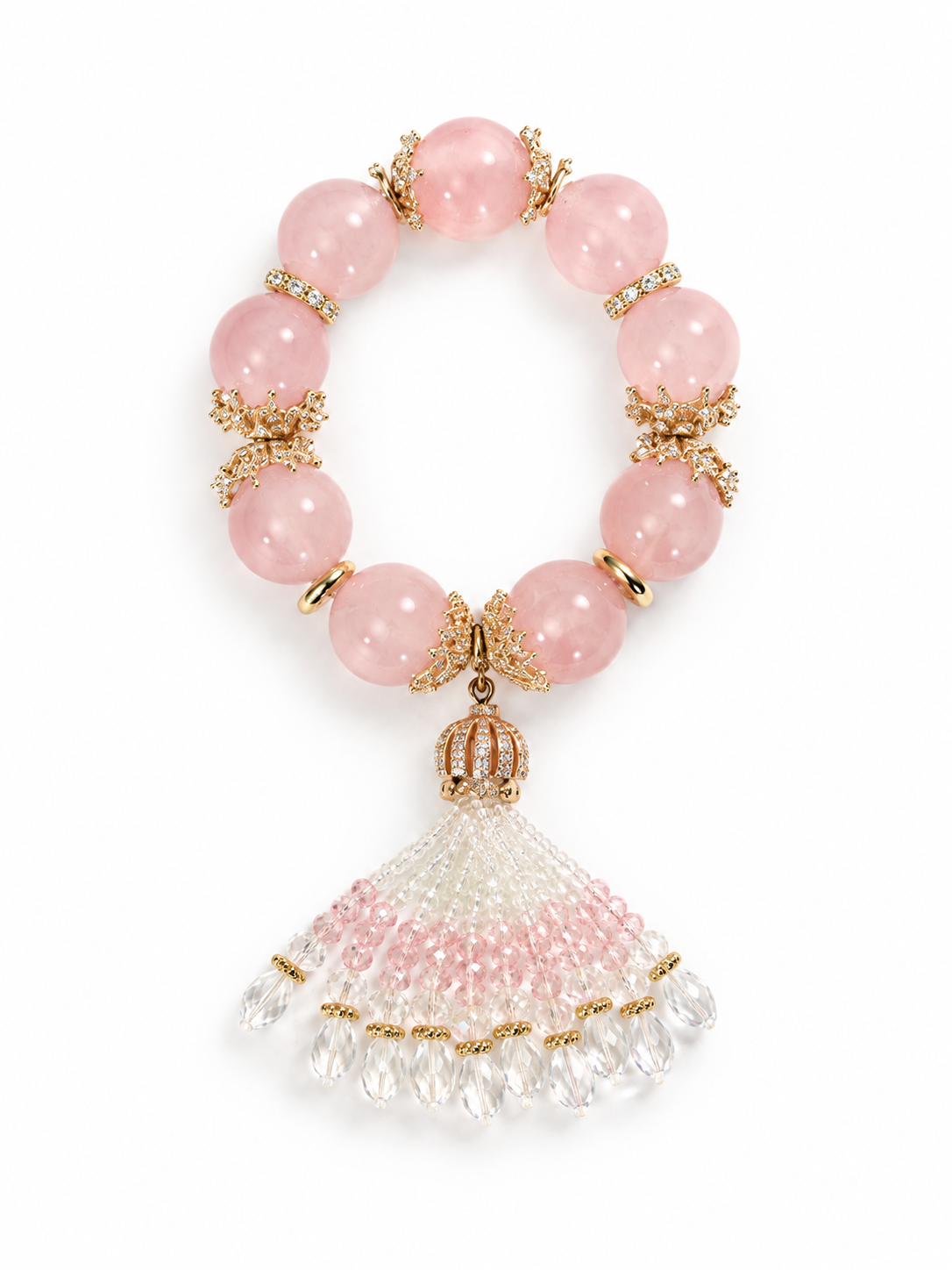 Rose quartz beaded bracelet with 18 mm pink beads, gold floral accents and a detachable pink and white glass fan tassel on a white background
