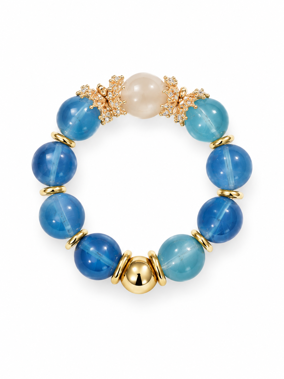 Deep blue aquamarine beaded bracelet with a white rabbit hair quartz crown bead, gold bead caps and a polished gold bead on a white background