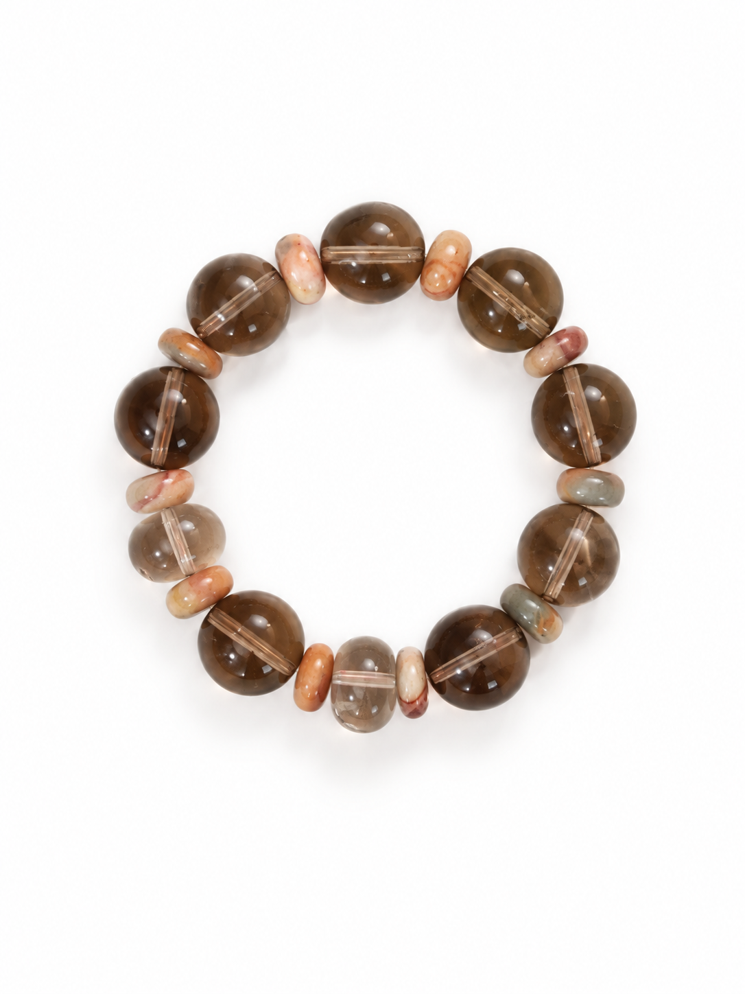 Smoky quartz beaded bracelet with 16 mm tea-brown quartz beads and patterned Alxa agate spacers on a white background