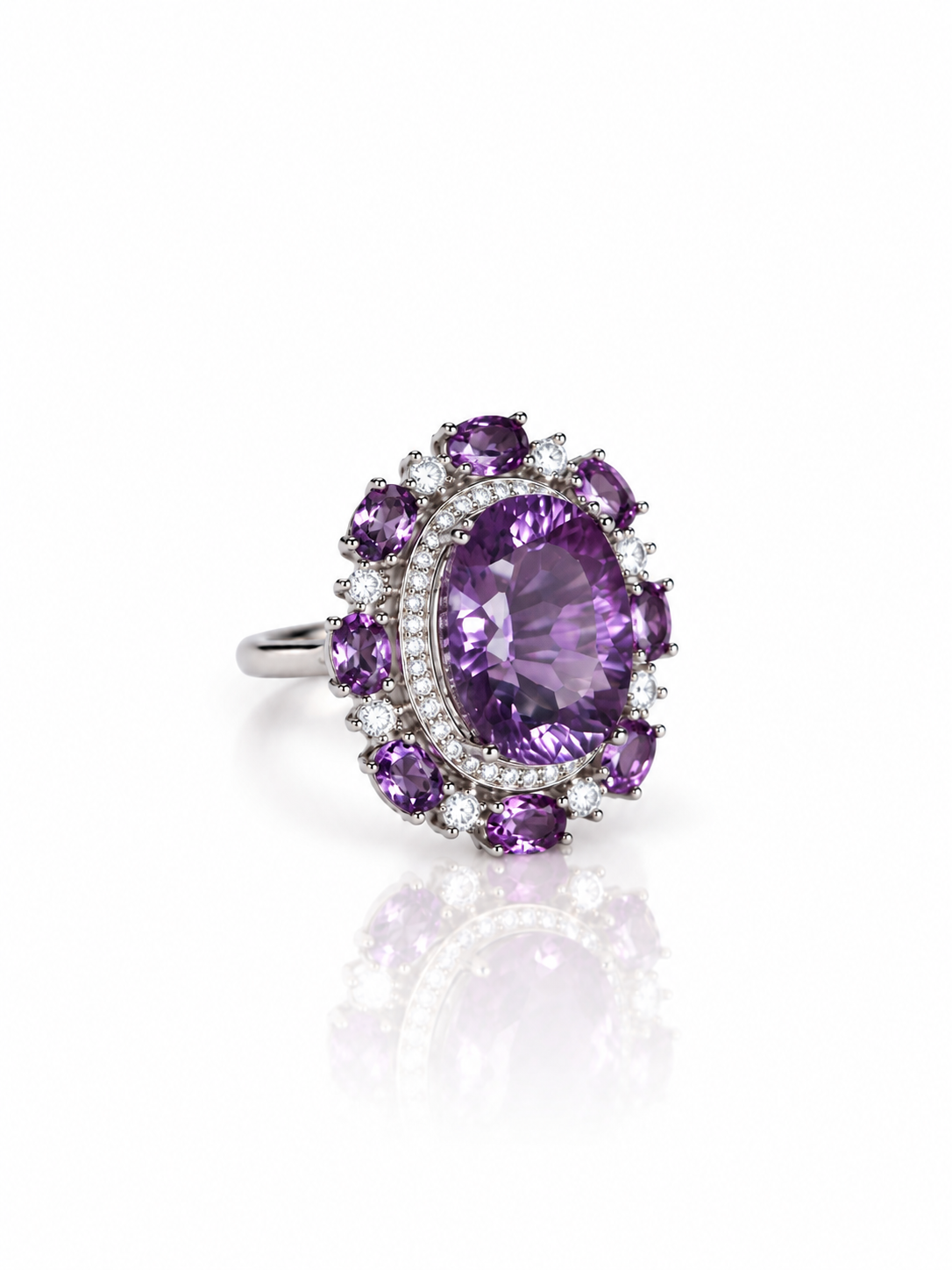 Amethyst cluster cocktail ring, angled view on a white background