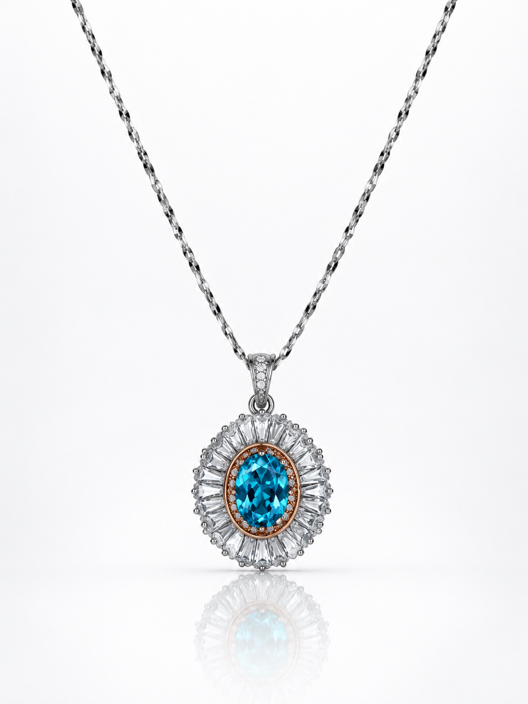 Blue topaz oval pendant necklace with a sunburst of baguette cubic zirconia in sterling silver on a white background