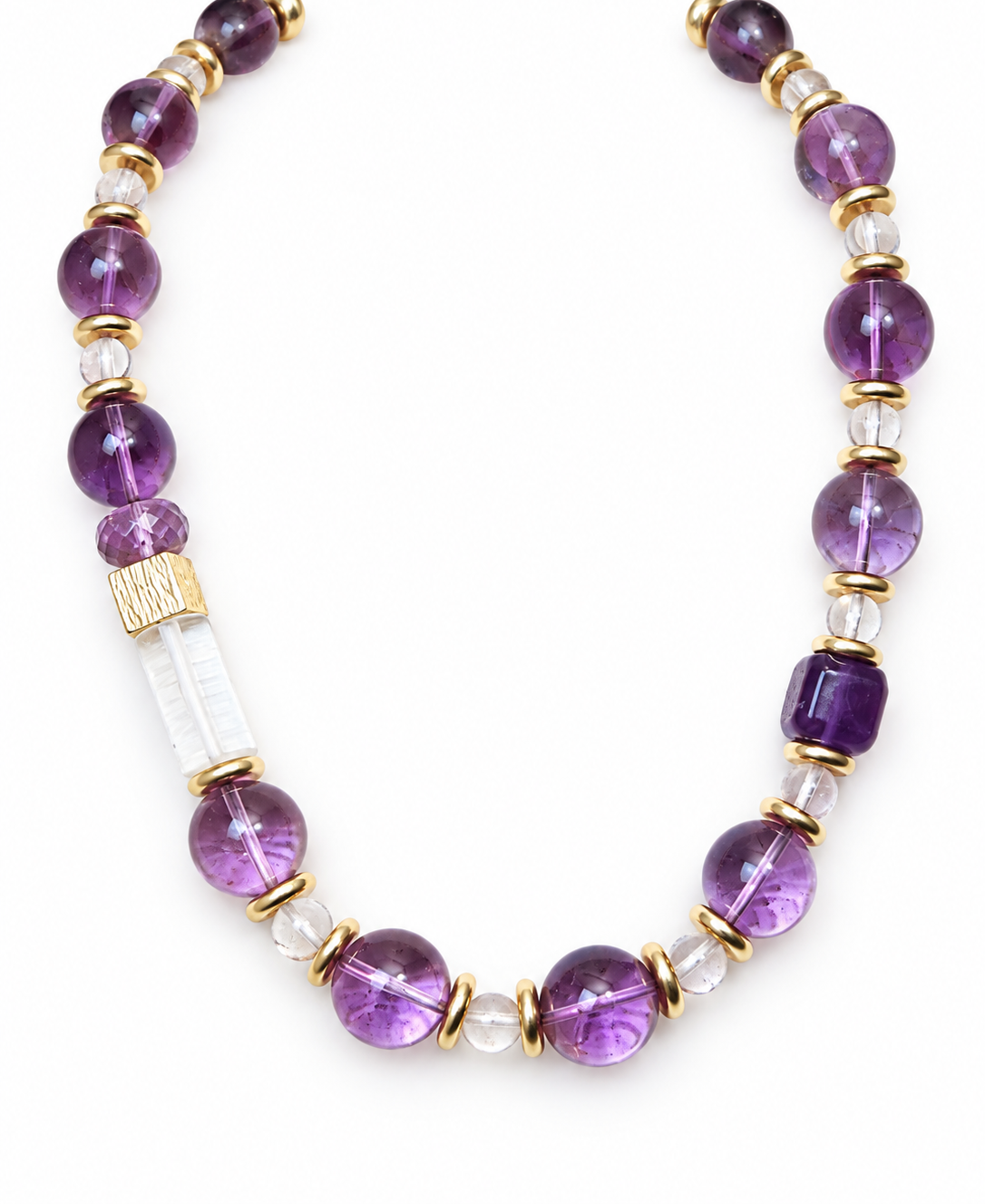 Amethyst beaded necklace with 15 mm violet beads, clear quartz rounds, gold spacers, a square amethyst and a clear quartz bar with gold band on a white background
