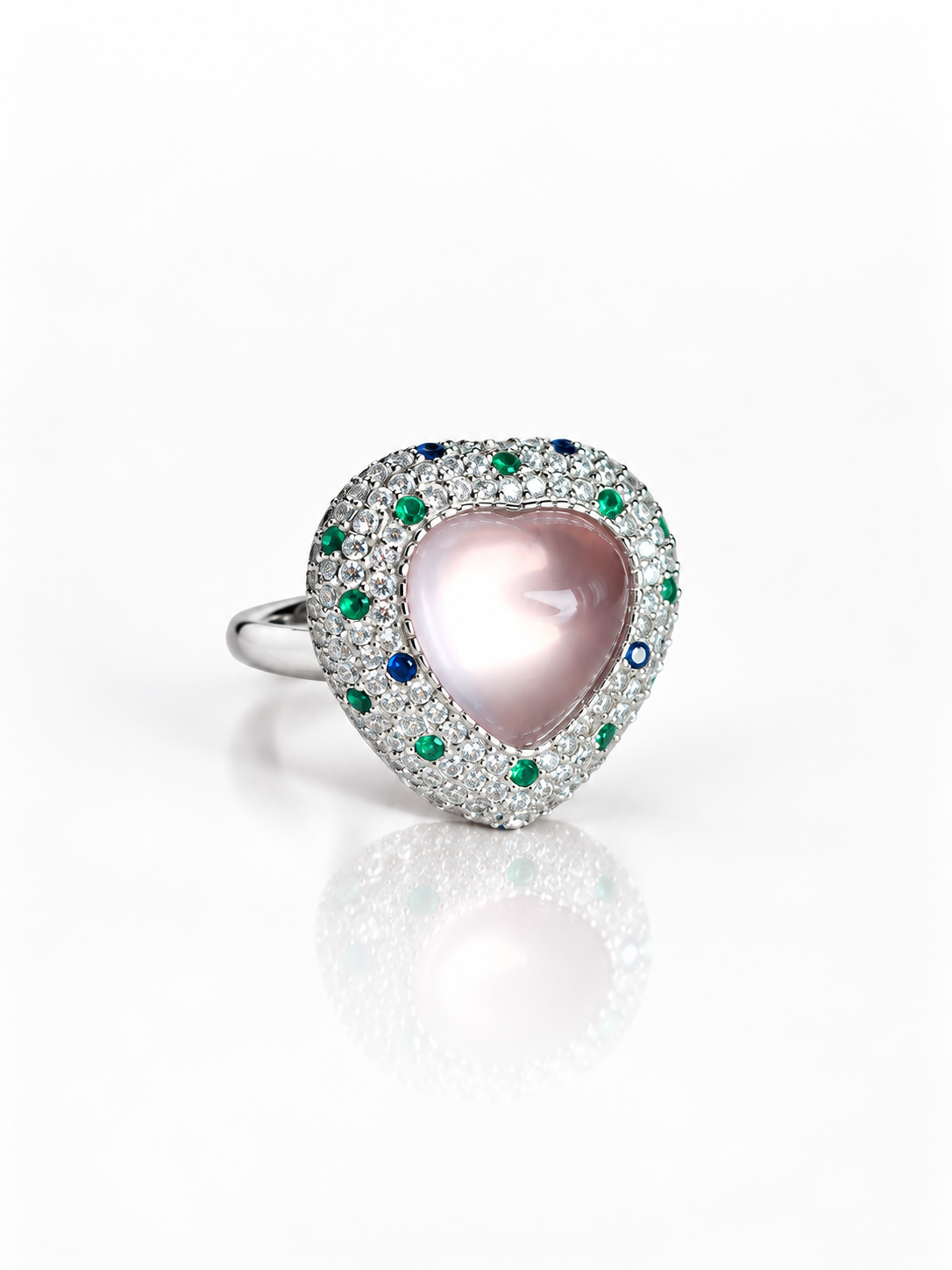 Rose quartz heart ring, angled view on a white background