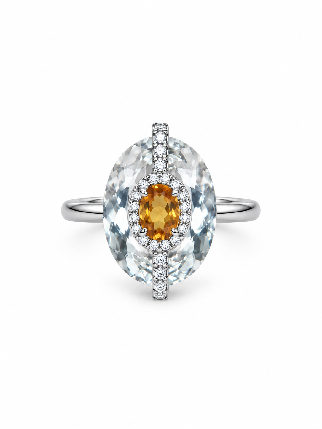 Clear quartz oval ring with a citrine centre and a line of cubic zirconia on a sterling silver band