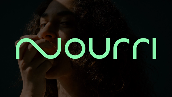 Nourri wordmark in mint green over a dark, close-cropped photo of a woman eating