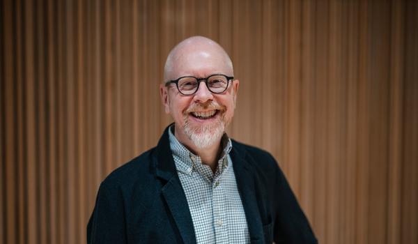 Christer Wiik Aram, fungerende leder for Akademikerne stat, smiler fornøyd etter at statsoppgjøret er i havn.