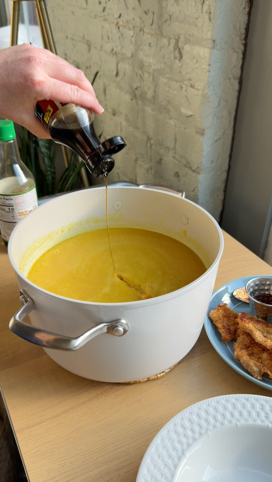 Ceramic stockpot filled with soup